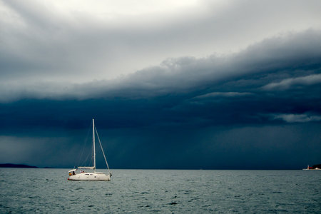 Sailboat returns to harbour at Zadar, Croatiaの写真素材