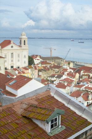 View of Lisbon wth church and river on the backgroundの写真素材