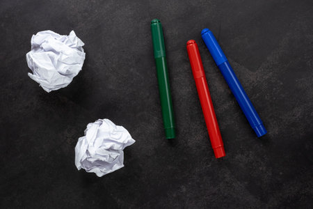 stationery multi-colored markers and scraps of crumpled paper, a failed artists workの写真素材