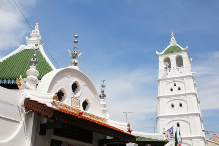 Doorway details and minaret of the Kampung Kling mosque in Melaka, Malaysia.のeditorial素材