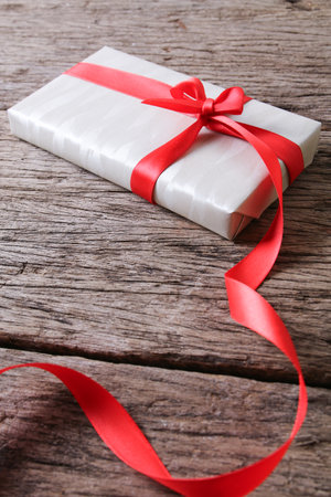 Present on wooden surfaceの写真素材