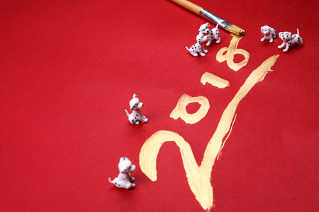 Miniature dogs with 2018 written in gold