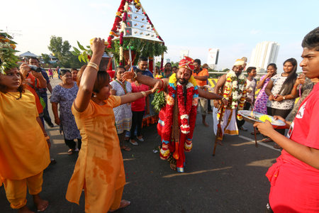 Hindu devotees celebrating Thaipusam at Batu Caves, Kuala Lumpur, Malaysia