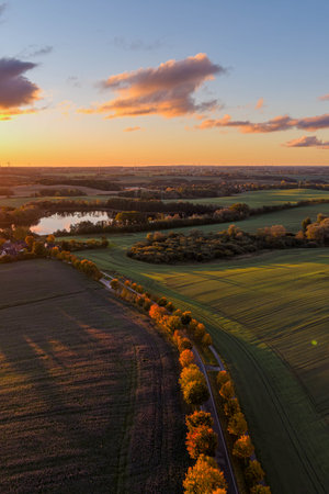 Aerial view of a beautiful sunset over the countryside.の写真素材