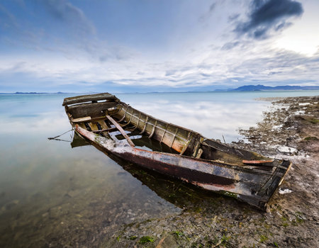 Old fishing boat on the shore of the island of Borneo.の写真素材