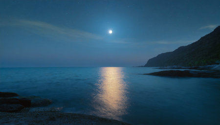 The moon over the sea at night. Long exposure, long exposureの写真素材