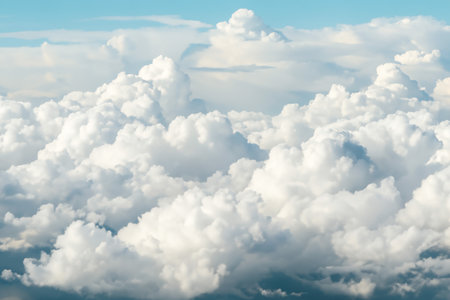 Blue sky background with tiny clouds. Cumulus clouds in the sky