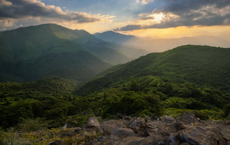 Mountain landscape at sunset. The view from the top of the mountain.の写真素材
