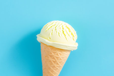 ice cream cone on blue background. Ice cream cone on blue backgroundの写真素材