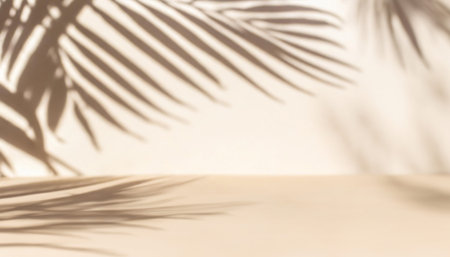 Shadow of palm leaves on a white wall. Abstract background for design.の写真素材