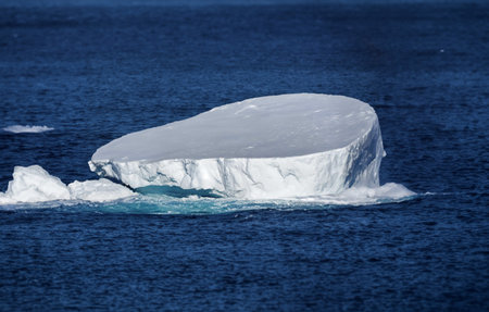 Antarctic iceberg in the waters of the Antarctic Ocean, Antarctica