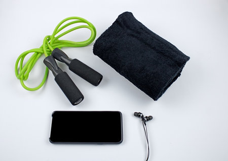 smartphone, skipping rope , black towel, heaphones, indoor sports onlineの写真素材