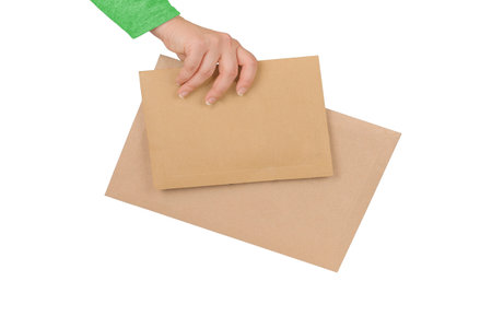 Hand delivered cardboard envelopes, isolatedの写真素材