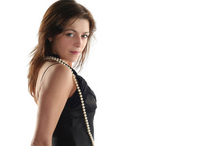 Girl in black dress isolated on white backgroundの写真素材