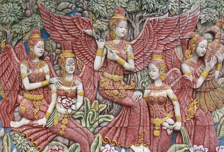 Mythical female bird with a human head on the wall の写真素材