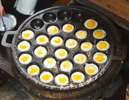 Thai Style Cooking of Fried Quail Eggsの写真素材