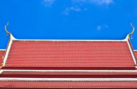 Red roof and blue skyの写真素材