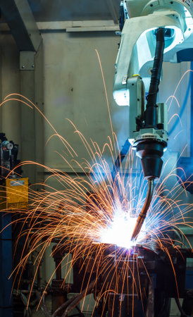 Robots welding in a car factoryの写真素材
