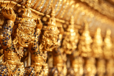 giant statue on the wall in Watの写真素材