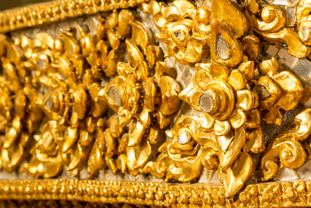 Thai art on the wall at Emerald Buddha Templeの写真素材