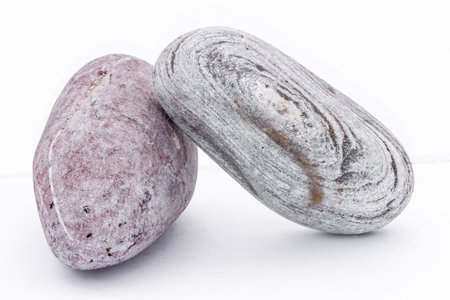 round stones isolated on white backgroundの写真素材