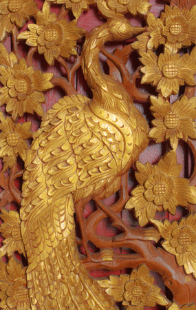 Carved wood beautiful bird photoの写真素材