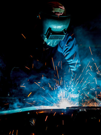 Industrial steel welder in factoryの写真素材
