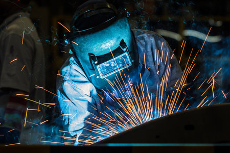 Industrial steel welder in factoryの写真素材