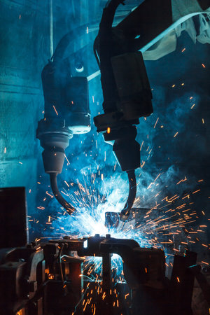 robots welding in a car factoryの写真素材