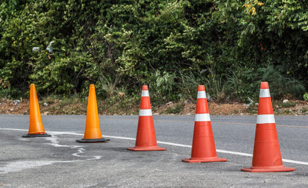 Row of Traffic cone in the roadの写真素材