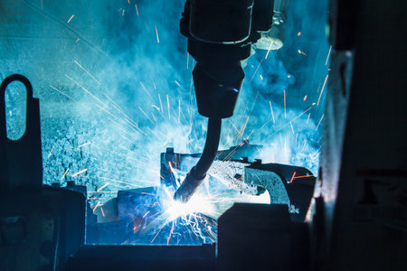 Welding robots movement in a car factoryの写真素材