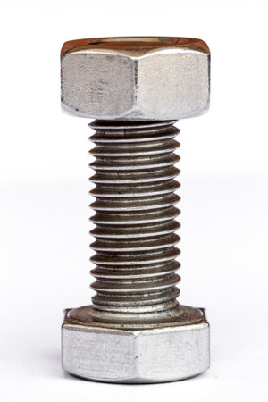 bolt and nut isolated on white backgroundの写真素材