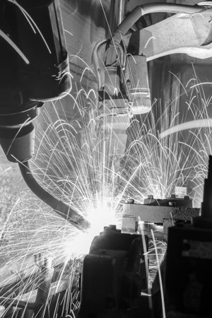 Welding robots movement in a car factory