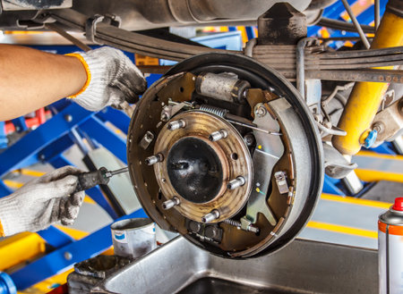 maintenance car brakes hub in garageの写真素材