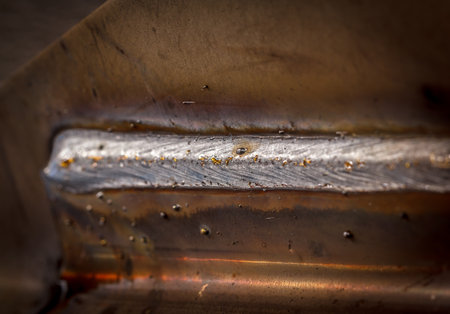 welding seam onto steel sheet metal Industrial steel welder in factoryの写真素材