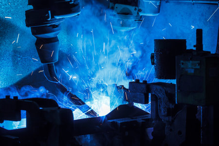 The welding robots represent the movement in the automotive parts industry