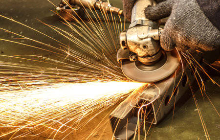 Flame sparks with electric grinder Change the swaying back and forth all the timeの写真素材