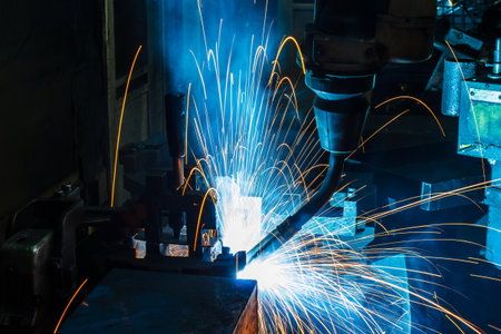 Welding robots movement in a car factoryの写真素材