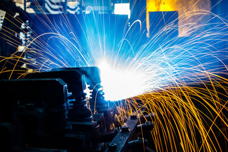 Welding robots movement in a car factoryの写真素材