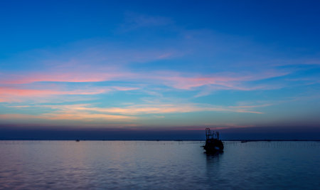 Beautiful Twilight in the evening by the sea.の写真素材