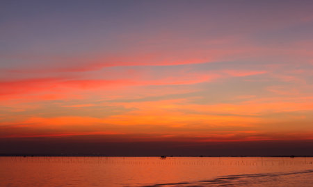 Beautiful Twilight in the evening by the sea.の写真素材