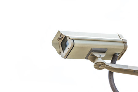Security video camera on white background.