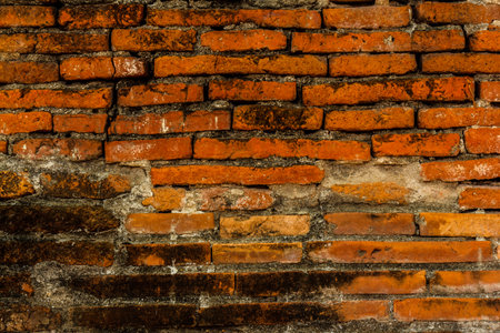 The Beautiful old red brick wall background.