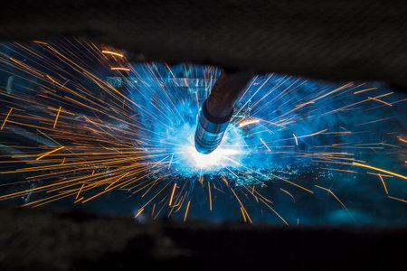 Welding robots movement in a car factory, automotive parts industry