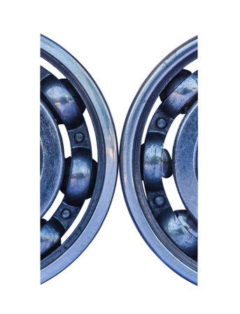 Half-ball bearings isolated from white background.