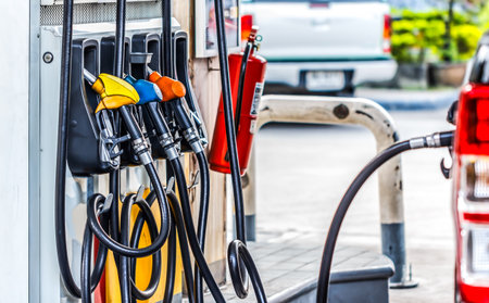 Pump nozzles in a service station, Gasの写真素材