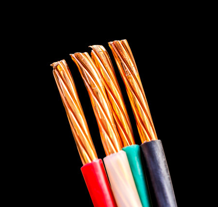 closeup of a electric cable on a black backgroundの写真素材