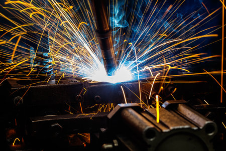 Light from the welding of robot automotive parts of the production line.の写真素材