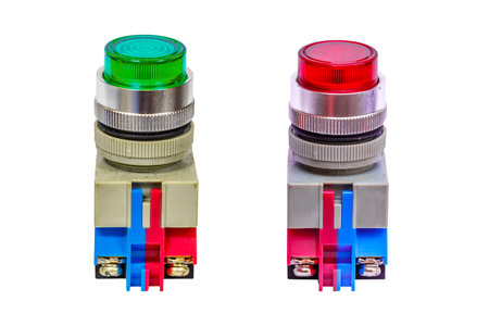 Green and red start button on a white background.の写真素材
