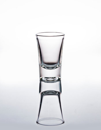 Beautiful Empty glass. Isolated on white backgroundの写真素材